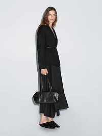 Asymmetric box pleat skirt