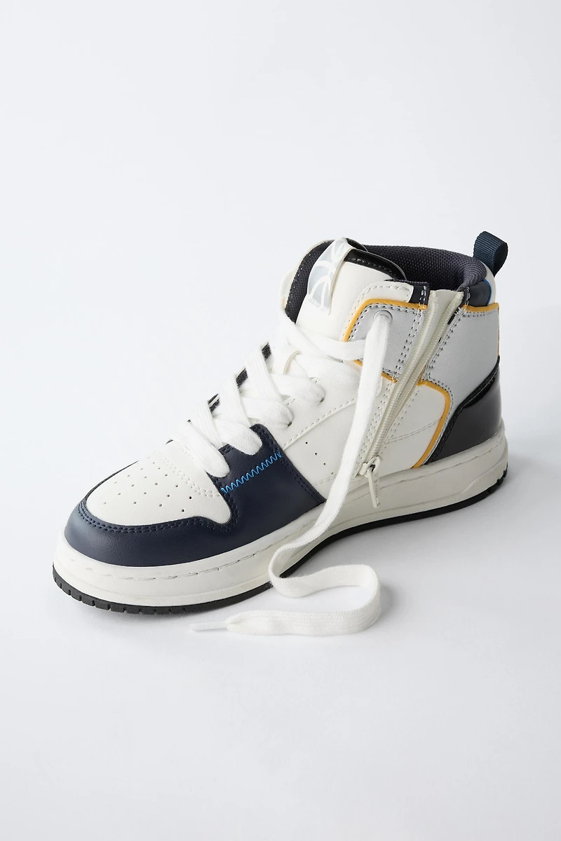 HIGH TOP SNEAKERS WITH PIECES