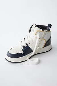 HIGH TOP SNEAKERS WITH PIECES