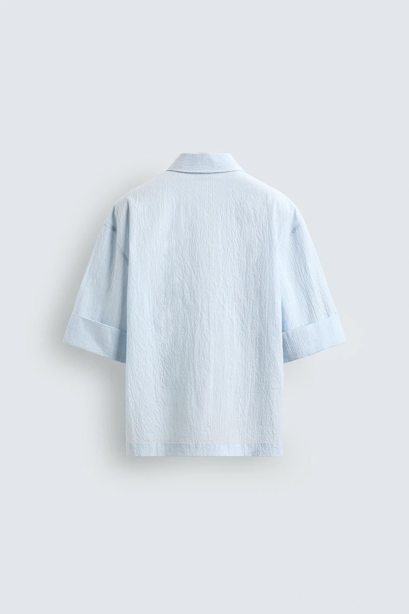 CHEMISE POLO COUPE BOXY TEXTURÉE