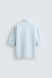 CHEMISE POLO COUPE BOXY TEXTURÉE