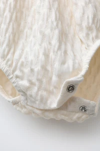 LACE TEXTURED BODYSUIT