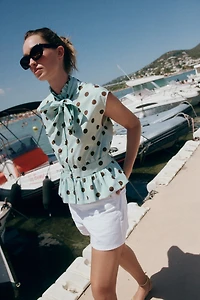 SLEEVELESS POLKA DOT BOW SHIRT