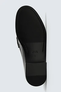 MOCASSINS EN CUIR AVEC MASQUE
