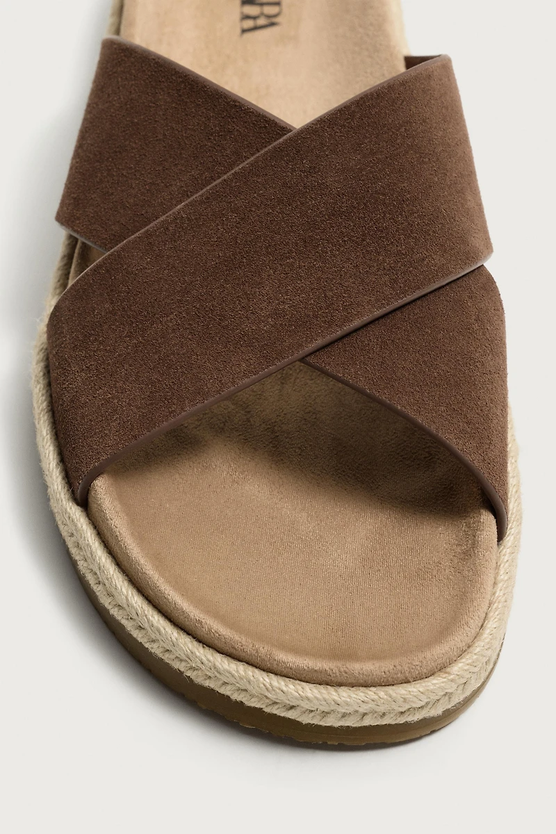 LEATHER CROSSOVER SANDALS