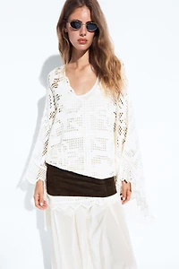 Crochet knit cape