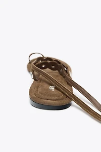 LEATHER SANDALS WITH METAL EYELETS