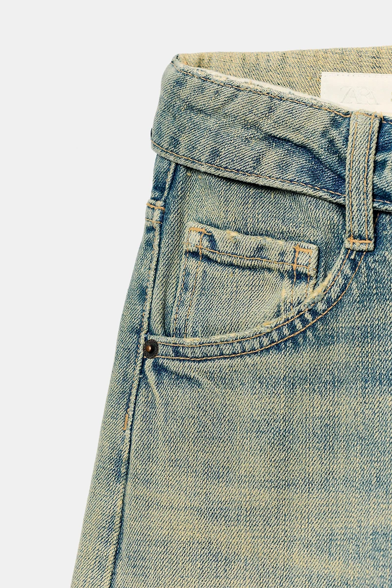 TRF MID-RISE RIPPED FOLDED WAISTBAND JEANS