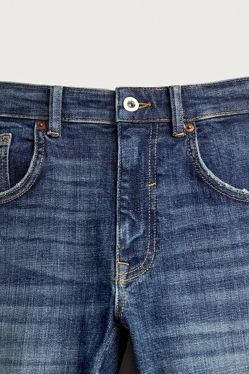 DISTRESSED SKINNY FIT JEANS