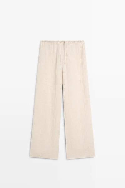 Total look flowing waffle-knit linen blend trousers