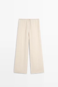 Total look flowing waffle-knit linen blend trousers