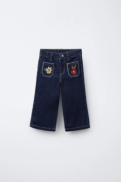 EMBROIDERED POCKET NAVY JEANS