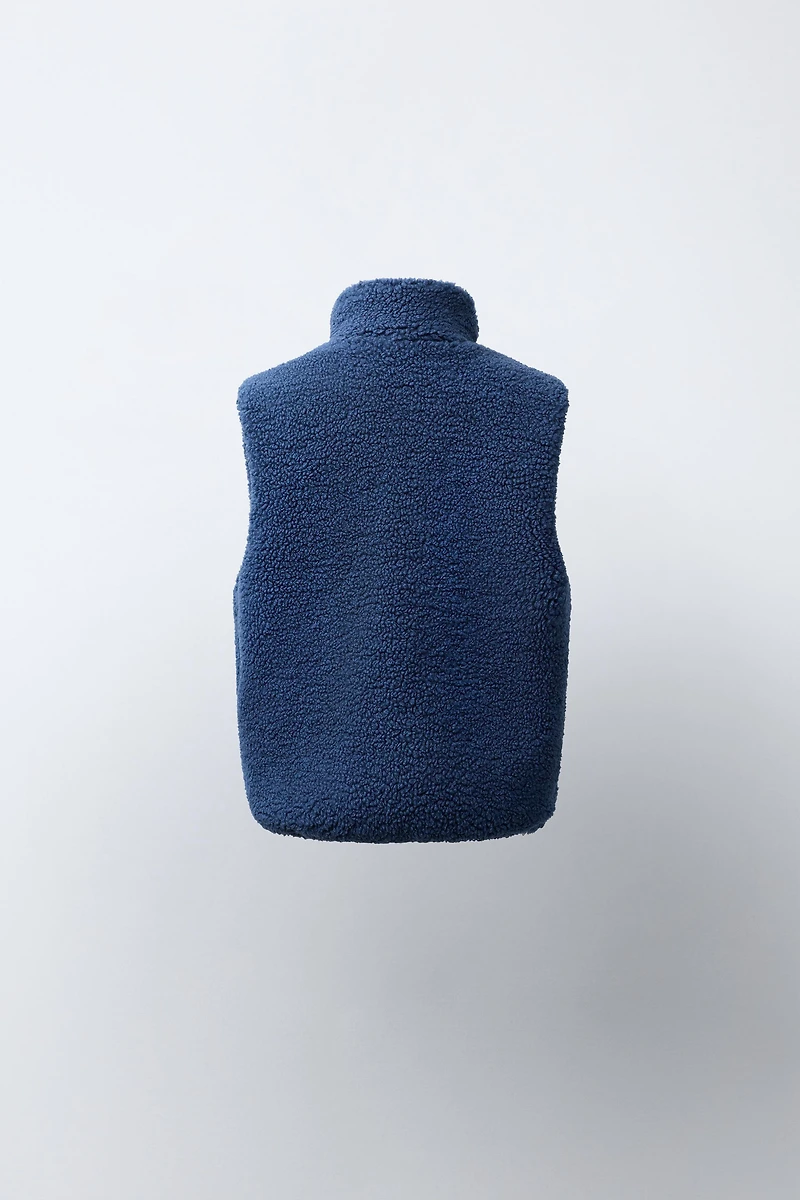 CONTRASTING FAUX SHEARLING VEST
