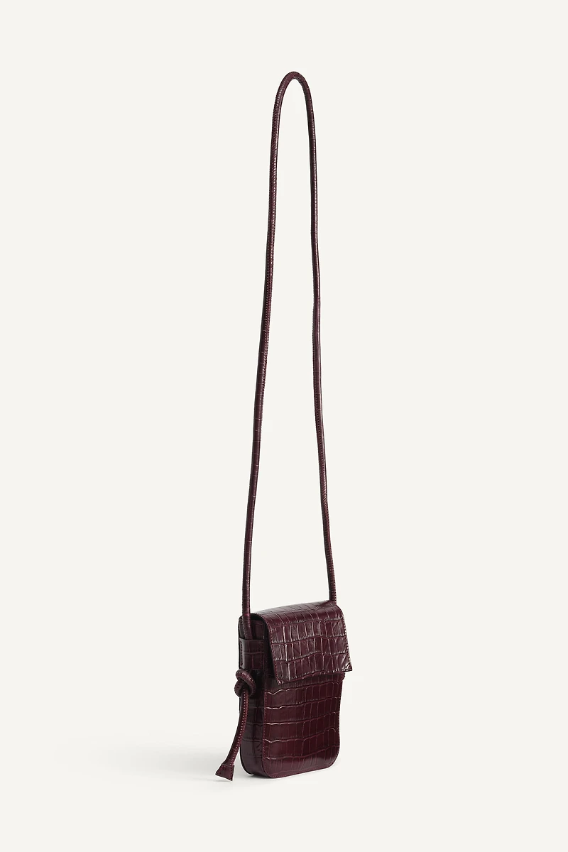 LIMITED EDITION EMBOSSED LEATHER CROSSBODY BAG