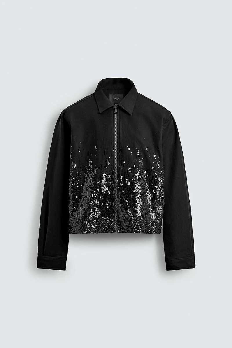 VESTE COURTE À PAILLETTES