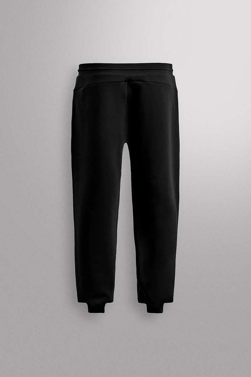 TECHNICAL ZIP PANTS