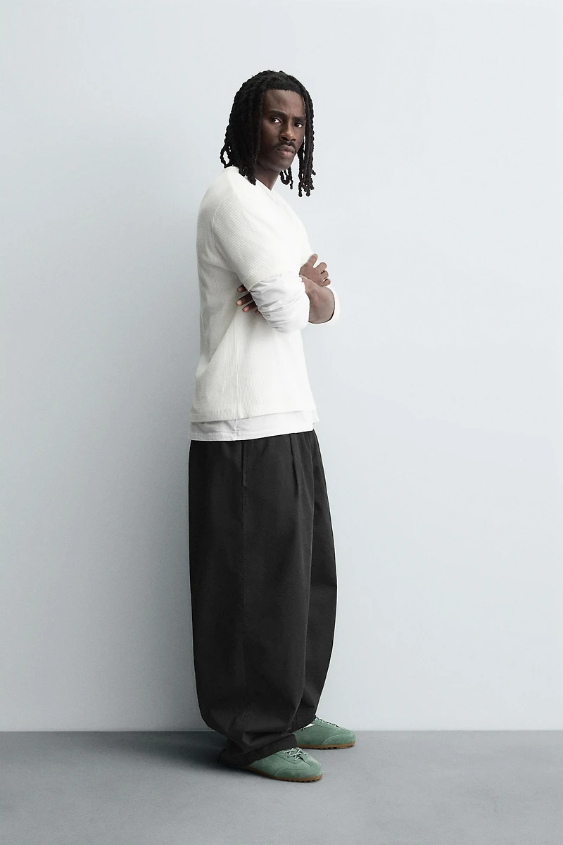 BALLOON FIT PLEATED PANTS