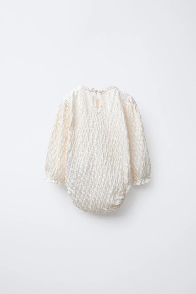 LACE TEXTURED BODYSUIT