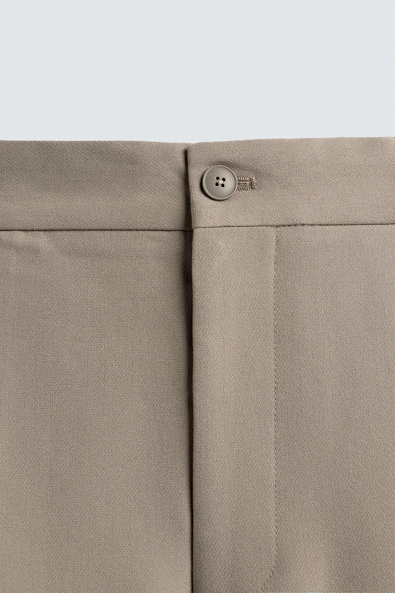 PANTALON RELAXED FIT À PLIS