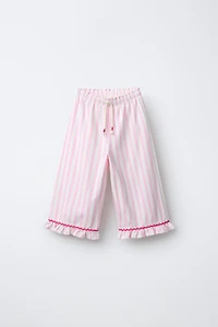 PANTALON À RAYURES TISSÉES ET VOLANTS