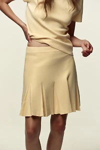 BOX PLEAT KNIT MINI SKIRT