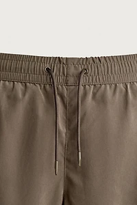 BASIC LONG SWIM TRUNKS