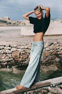 TRF MID-RISE PLEATED BELTED JEANS