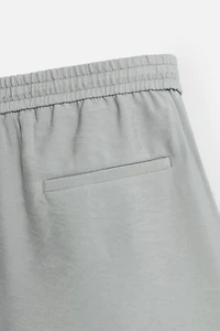 FLOWY RELAXED FIT BERMUDA SHORTS