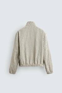 BLOUSON COURT AJUSTÉ À CARREAUX TEXTURÉ