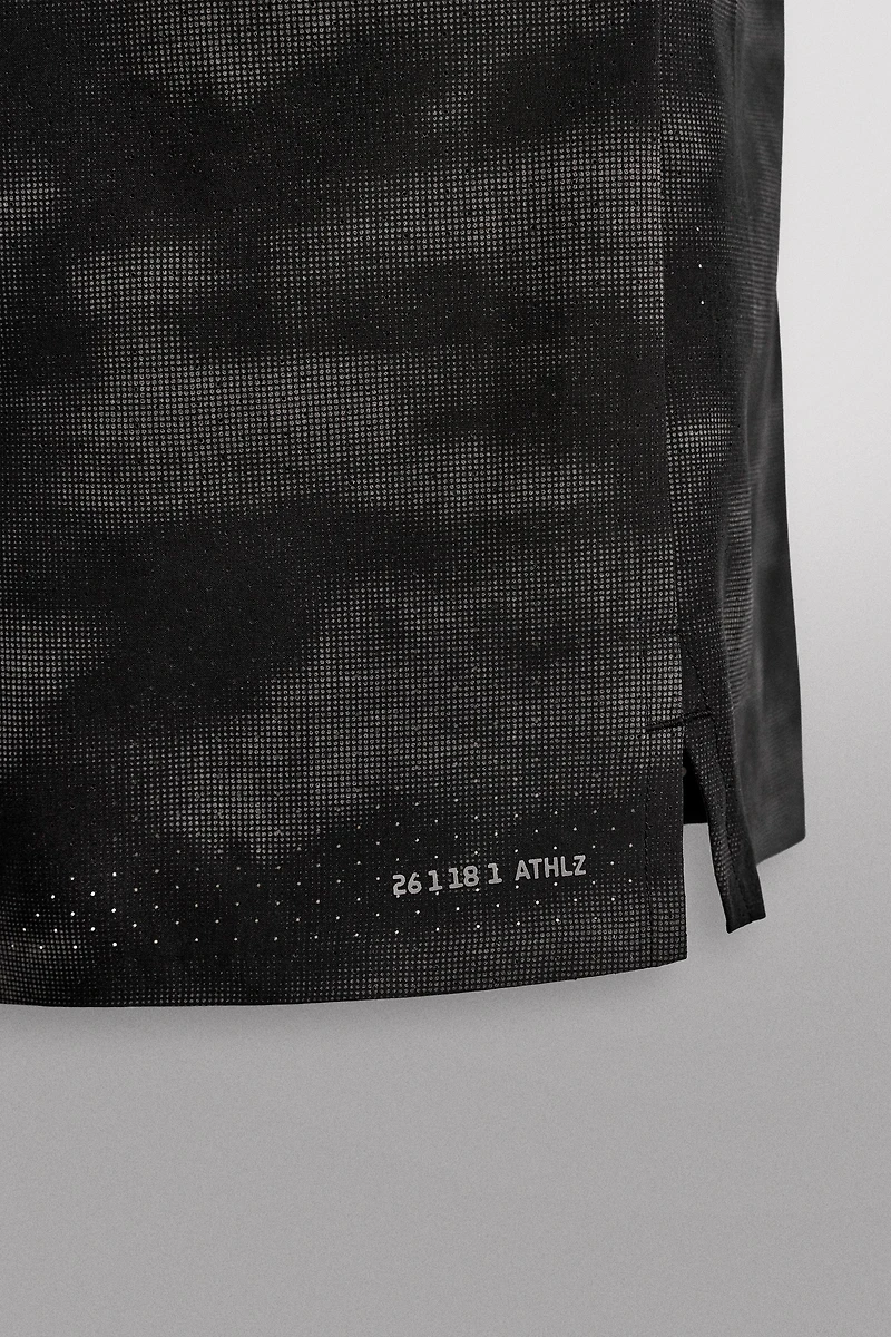 PERFORATED RUNNING SHORTS