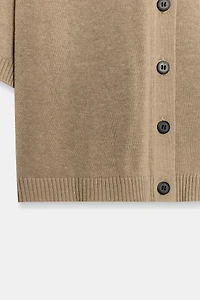 GILET EN MAILLE À MANCHES COURTES