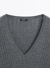 V-neck cable-knit sweater
