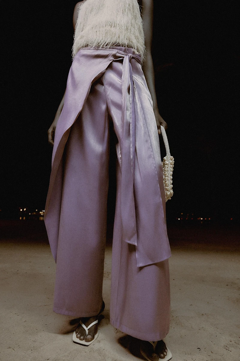 SHINY EFFECT WRAP PANTS