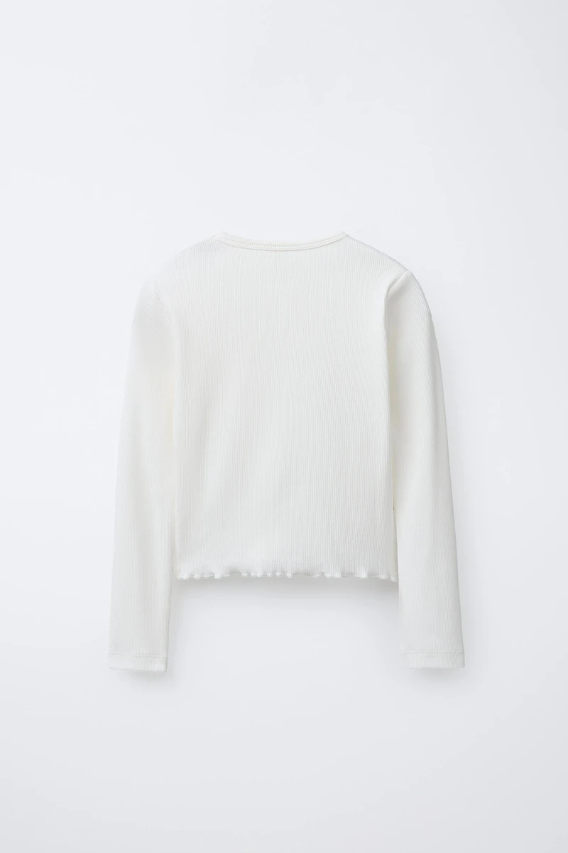 T-SHIRT AVEC APPLIQUÉ FLEURS