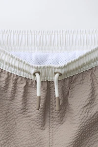 2-6 YEARS / LABEL SWIM SHORTS