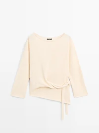 Asymmetric linen blend sweater with tie detail