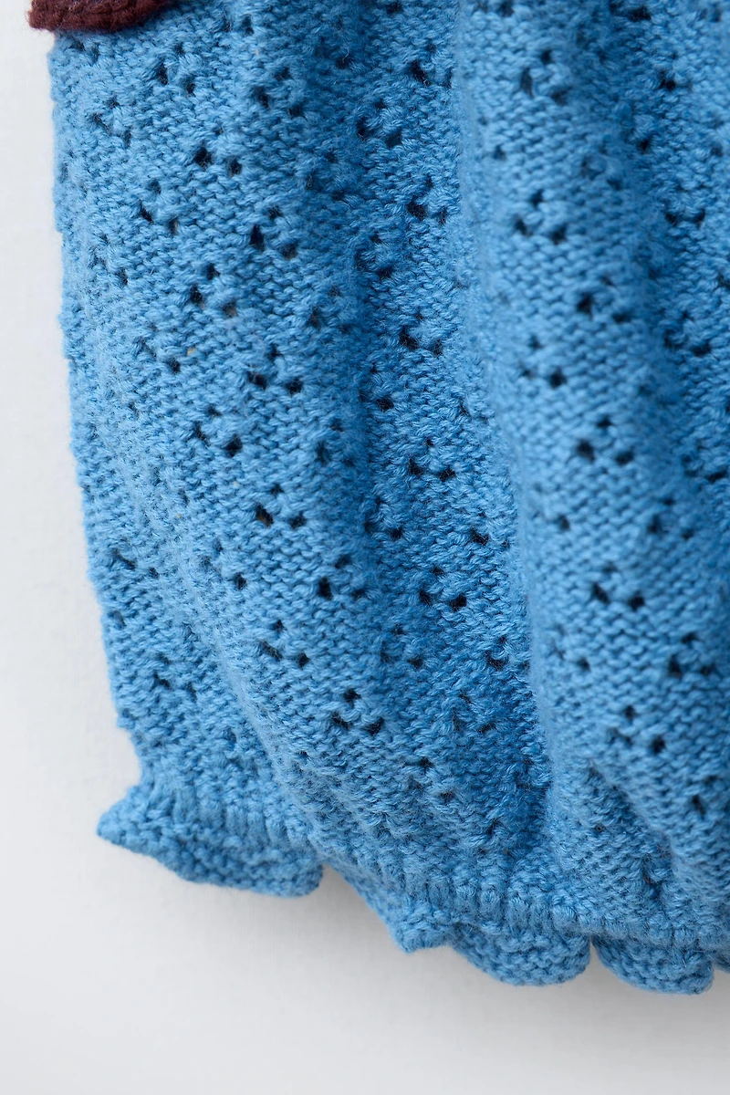 COTTON LINEN KNIT TOP WITH EMBROIDERY AND RUFFLES