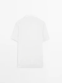 Textured knit short sleeve polo shirt