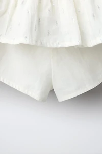 SHINY RUFFLE SKIRT