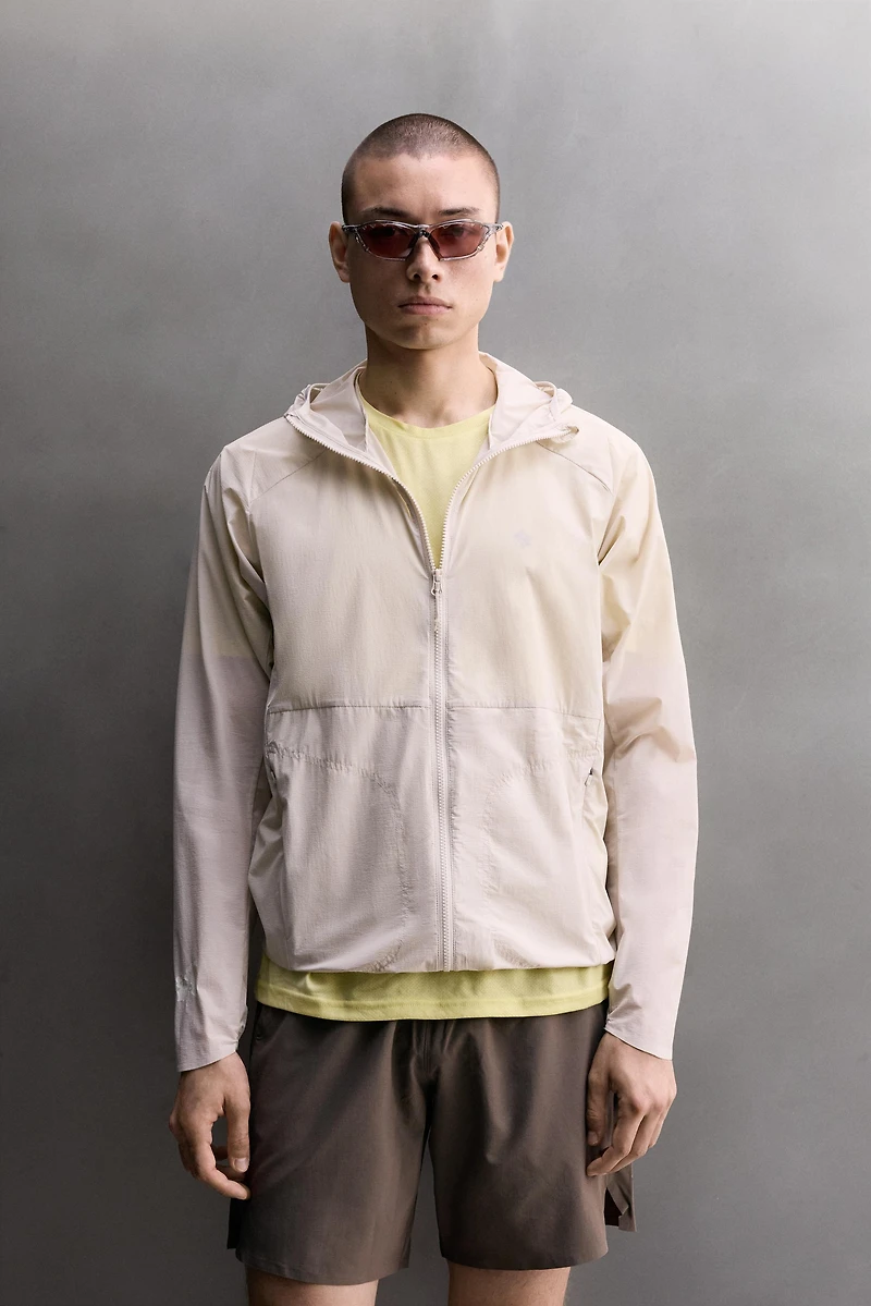 TECHNICAL WINDBREAKER JACKET