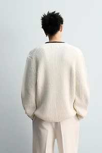 TEXTURED WEAVE HENLEY NECK SWEATER