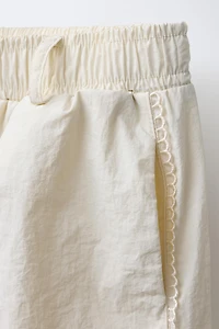 CONTRAST NYLON STRAIGHT LEG PANTS