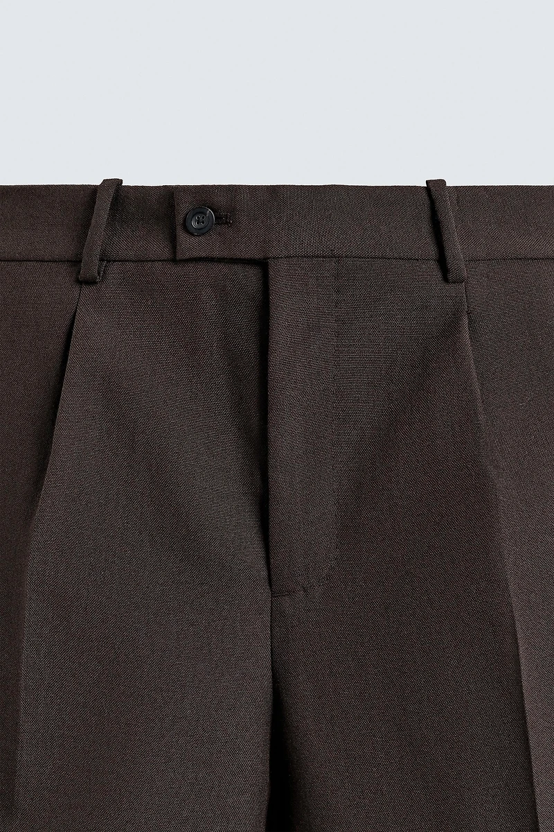 100% WOOL PLEATED PANTS