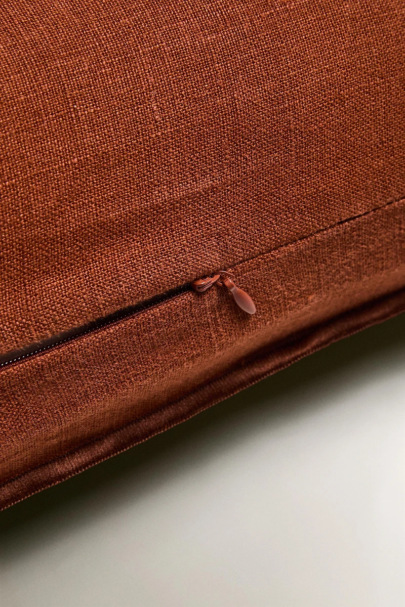 HOUSSE DE COUSSIN OVERLOCK
