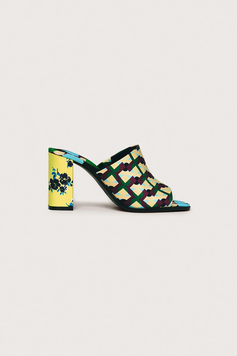MULES À TALONS ET MOTIFS LIMITED EDITION