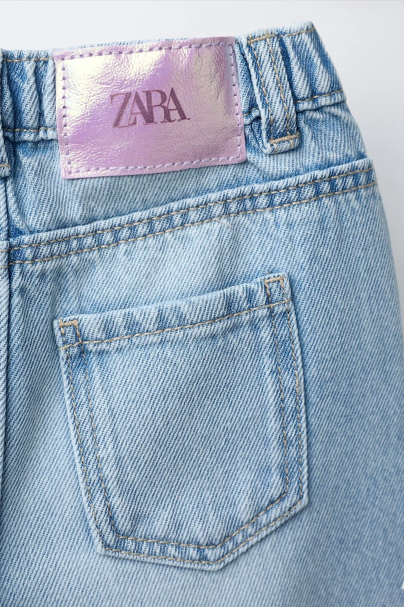 JEAN LARGE DÉCHIRÉ