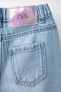 JEAN LARGE DÉCHIRÉ