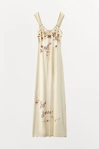 DRESS WITH EMBROIDERY, TEXT, AND BEADING