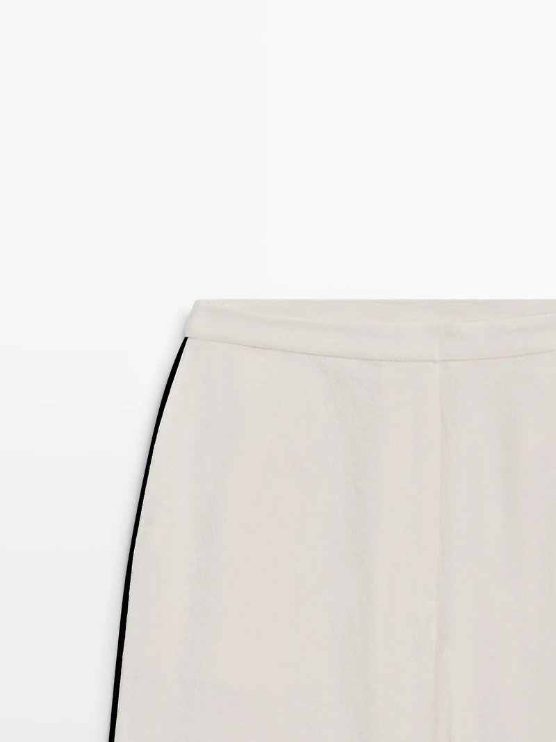 Pantalon en lin à ganse contrastée