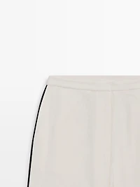 Pantalon en lin à ganse contrastée